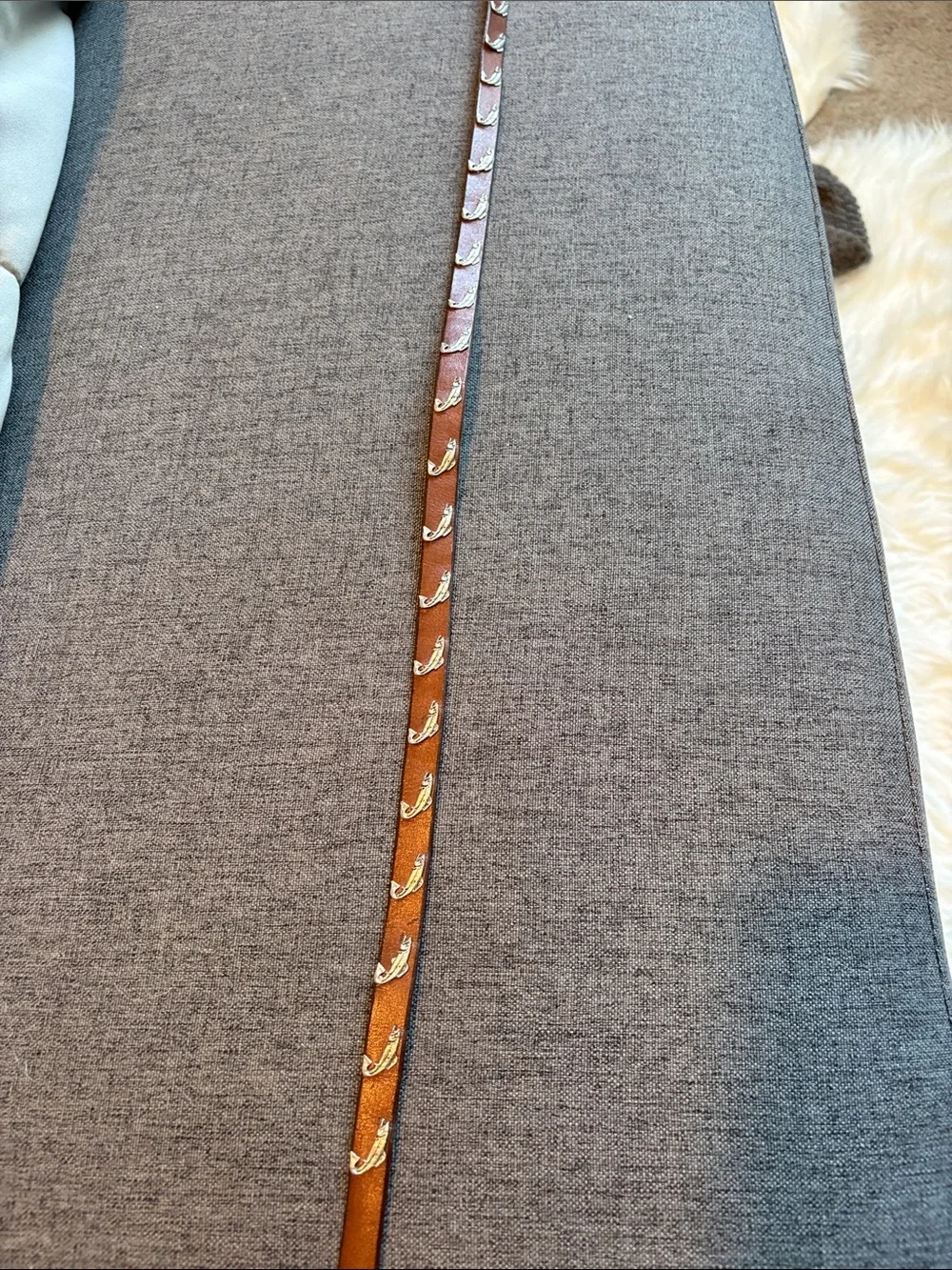 Hatband sterling silver trout on brown leather.